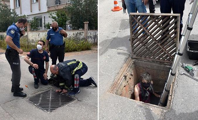 Film gibi; uyuşturucu için karantina bölgesine kanalizasyondan girmek isterken mahsur kaldı