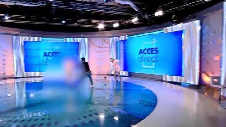 Romanya’da sunucu, canlı yayında çıplak bir kadının saldırısına uğradı