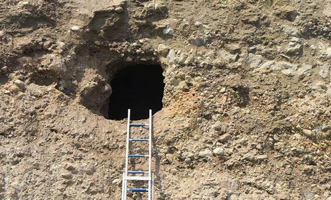 Heyelanda ortaya çıkan 'oygu mezar'da kurtarma kazısı