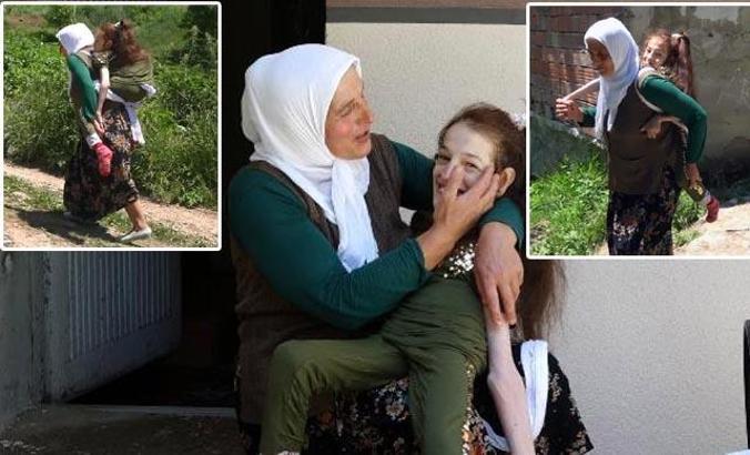 Engelli kızını sırtında taşıyan anne yol istiyor