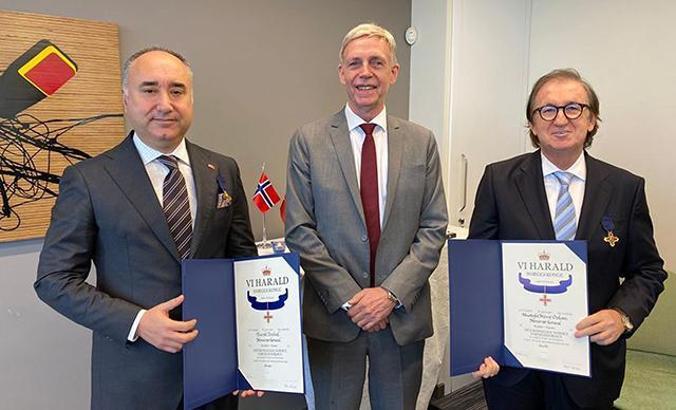 Turizmci Burak Tonbul ve Nüvit Özkan'a Norveç'ten Kraliyet Nişanı
