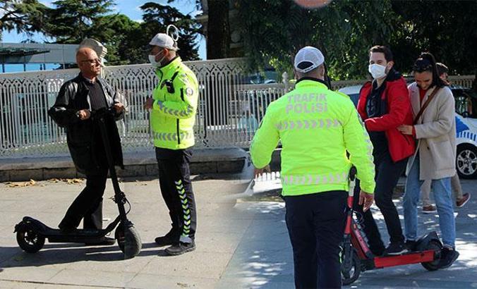Kaldırımdan giden, yük taşıyan scooter kullanıcılarına ceza yağdı