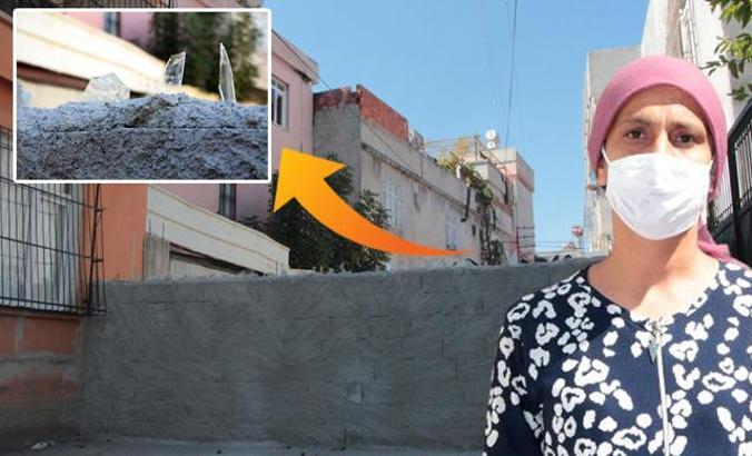 Tapulu arazisinden geçtiği iddiasıyla yola duvar ördürdü