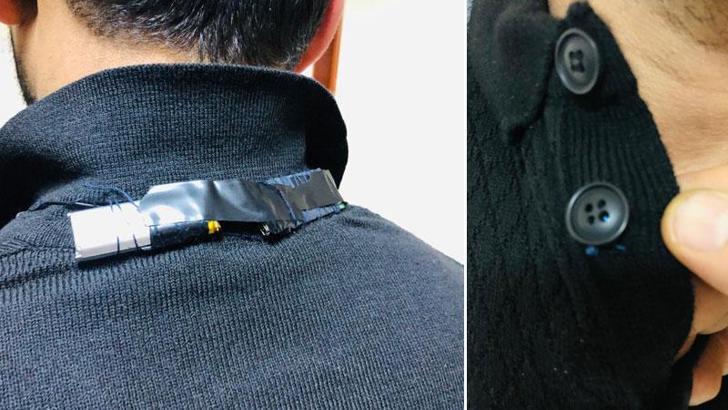 Ehliyet sınavına girerken, ses cihazı ve kamera ile yakalandı