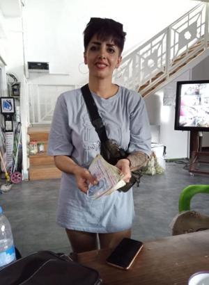 Pazarda bulunan para dolu cüzdan, İranlı sahibine ulaştırıldı