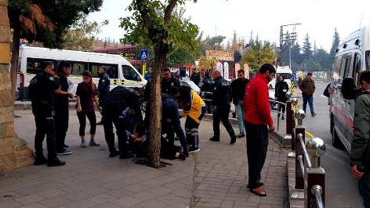 Sokak ortasında tartıştığı eşini bıçakla yaraladı