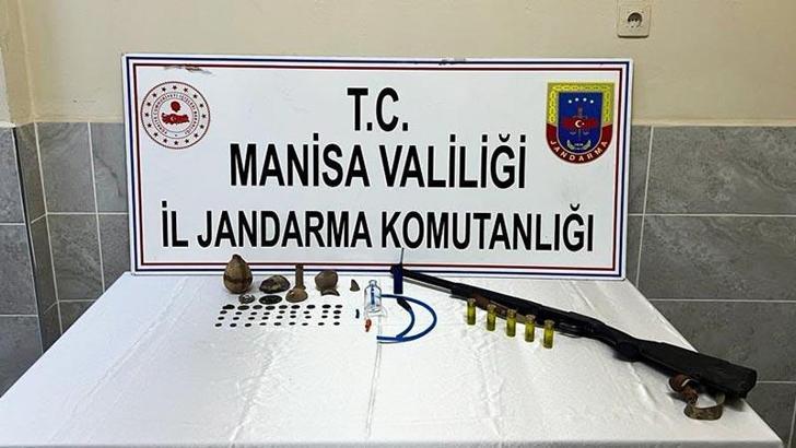 Hırsızlık şüphelisinin 2 evinde tarihi obje ve sikkeler ele geçirildi