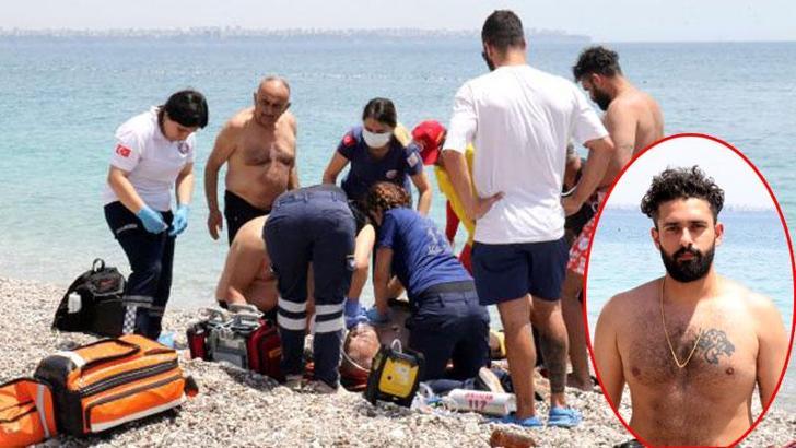 Denizde hareketsiz gördüğü kişiyi boğulmaktan kurtardı