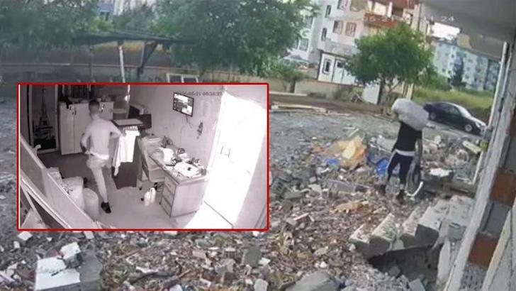 Depremde hasar gören apartmandan hırsızlık güvenlik kamerasında
