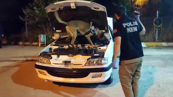Otomobilin yakıt deposundaki 21 kilo eroini 'Millow' buldu