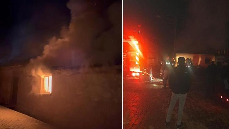 Tek katlı evde çıkan yangında 2 kişi dumandan etkilendi