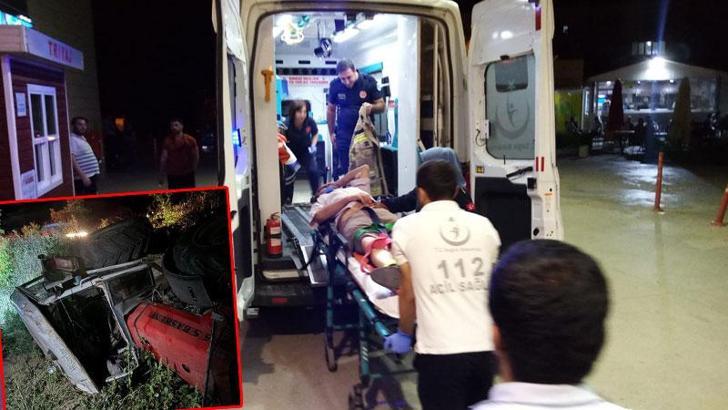 Tarlaya devrilen traktörün sürücüsünü kabin kurtardı