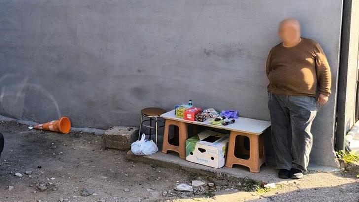 Gofret tezgahında sahte içki satarken yakalandı; o anlar kamerada