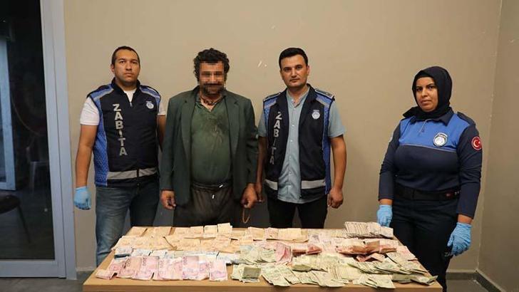 Dilencinin üzerinden 12 bin 980 TL çıktı