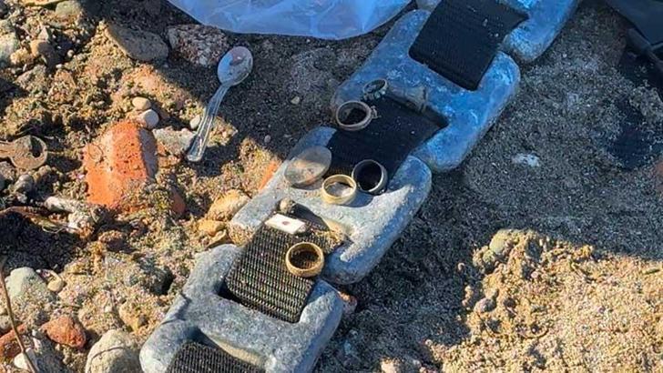 Denizde dedektörle altın arayan şüpheli, gözaltına alındı