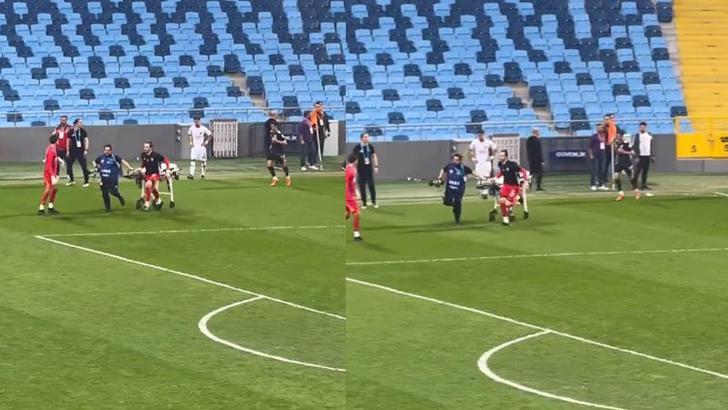 Baygınlık geçiren futbolcuya sedyeyi kulüp personeli taşıdı