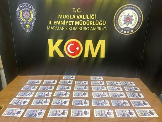 Marmaris’te sahte dövizle alışveriş yapan turist, sınır dışı edildi