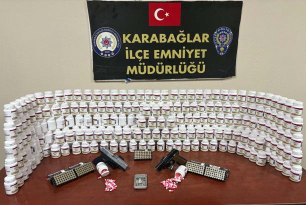 İş yerinde uyuşturucu ve ruhsatsız silahla yakalandı