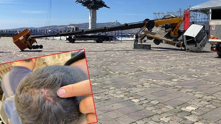 İzmir'de sahne kurulumu sırasında vinç devrildi; çalışanlar gazetecileri darbetti