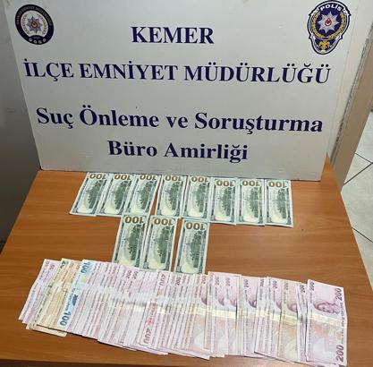 Sahte dolarla esnafı dolandıran şüpheliler tutuklandı
