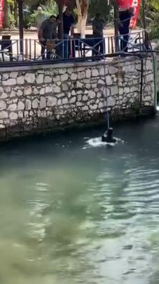 Polisi görünce atladığı derede boğulma tehlikesi yaşadı, hortumla kurtarıldı