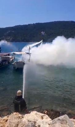 Yanan tekneye hortum, jet ski ve flyboard ile müdahale