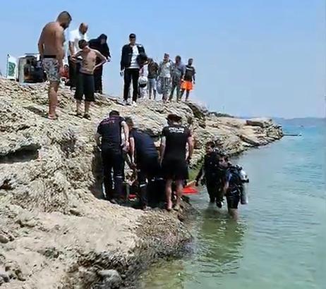 Serinlemek için girdiği baraj gölünde kayboldu, dalgıç polisler buldu