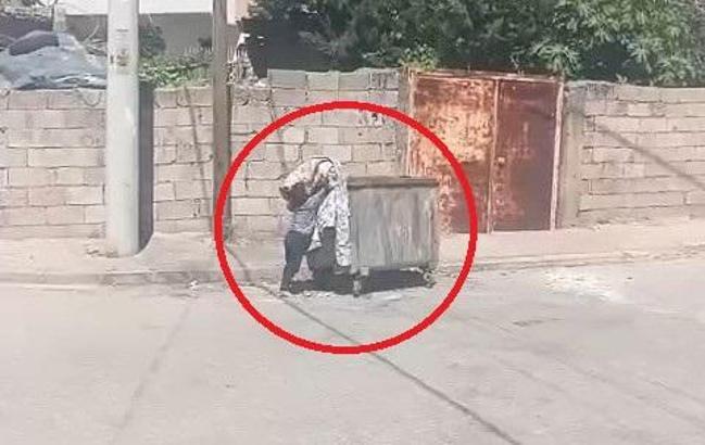 Çocuğun eski kilimi konteynere attığı anlar kamerada; ödüllendirilecek