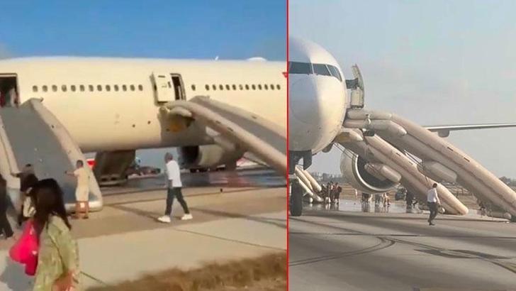Antalya Havalimanında iniş takımından duman çıkan uçağın yolcuları slayt açılarak tahliye edildi
