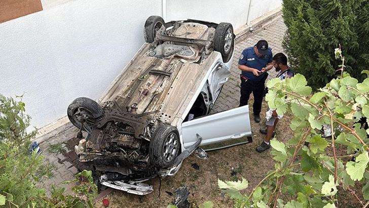 Kaza sonrası savrulan otomobil apartman bahçesine düştü: 3 yaralı