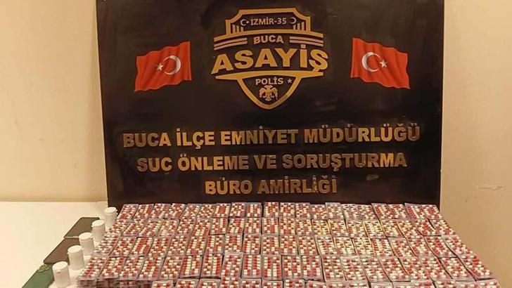 Buca'da 11 bin 296 sentetik hap ele geçirildi