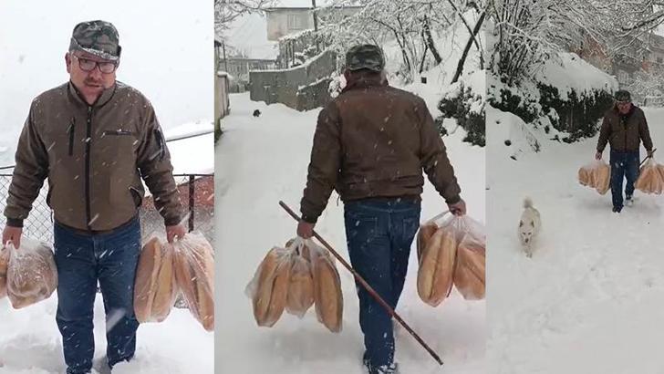 Yolu kar nedeniyle kapanan köyüne ekmek taşıdı