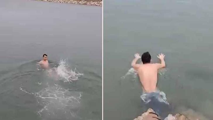 Soğuk havaya aldırmadan denize girip, yüzdü