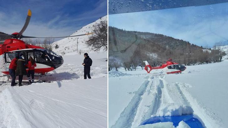 Yolu kardan kapanan köydeki hasta, ambulans helikopterle hastaneye kaldırıldı
