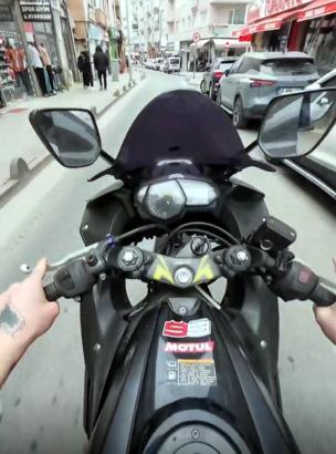 Tek tekerlek üzerinde ilerleyen motosikletin sürücüsüne 71 bin lira ceza