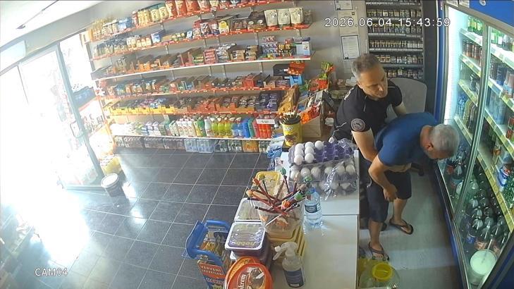 Nefes borusuna şeker kaçan bakkalı, polis Heimlich manevrasıyla kurtardı