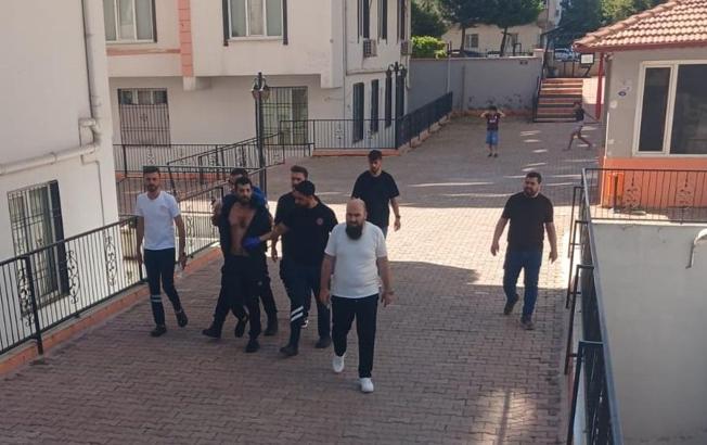 Hamile eşi ile üvey çocuklarını darbetti