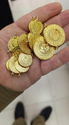 Bağışlanan kıyafetlerden 23 altın ile 6 bin 500 lira çıktı