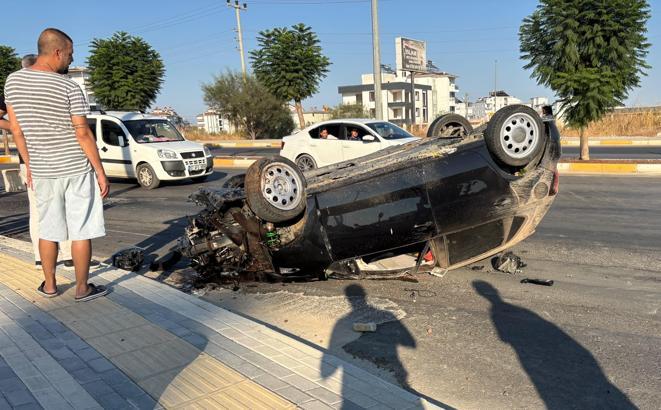 Refüje çarpan otomobil takla attı: 2 yaralı