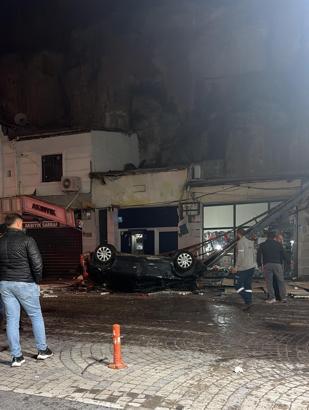 Kayseri’de 50 metre yükseklikten iş yerlerinin üzerine otomobilin sürücüsü yaralandı