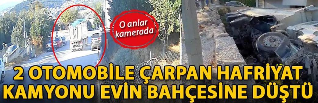 2 otomobile çarpan hafriyat kamyonu, evin bahçesine düştü