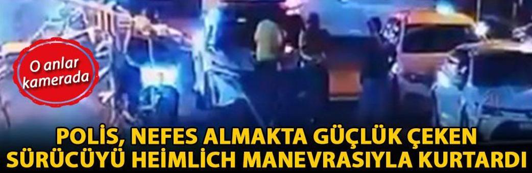 Polis, nefes almakta güçlük çeken sürücüyü, heimlich manevrasıyla kurtardı; o anlar kamerada