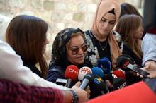 Cenazede yan yana geldiler