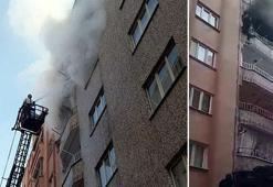 Yangında 4'üncü kat balkonundan sarkan ev sahibini itfaiye kurtardı