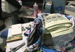 Ataşehir'de sahte para basılan matbaaya polisin baskın anı kamerada