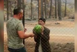 93 years old wildfire victim offered watermelons to the forest workers