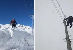 1 metre karda yürüyerek bölgeye ulaşıp arızaları giderdiler