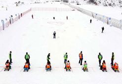 Erciyes'te eşler arası 'Artık çekilmez oldun' kızak yarışması