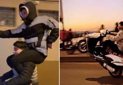 Beğeni uğruna... Omzunda taşıdığı arkadaşıyla motosiklet sürdü