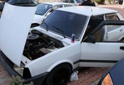 Çaldıkları otomobilin jantlarını boyarken yakalandılar